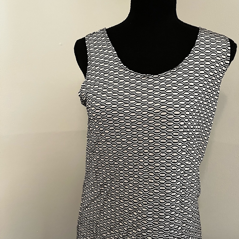 Chico’s black and white top.